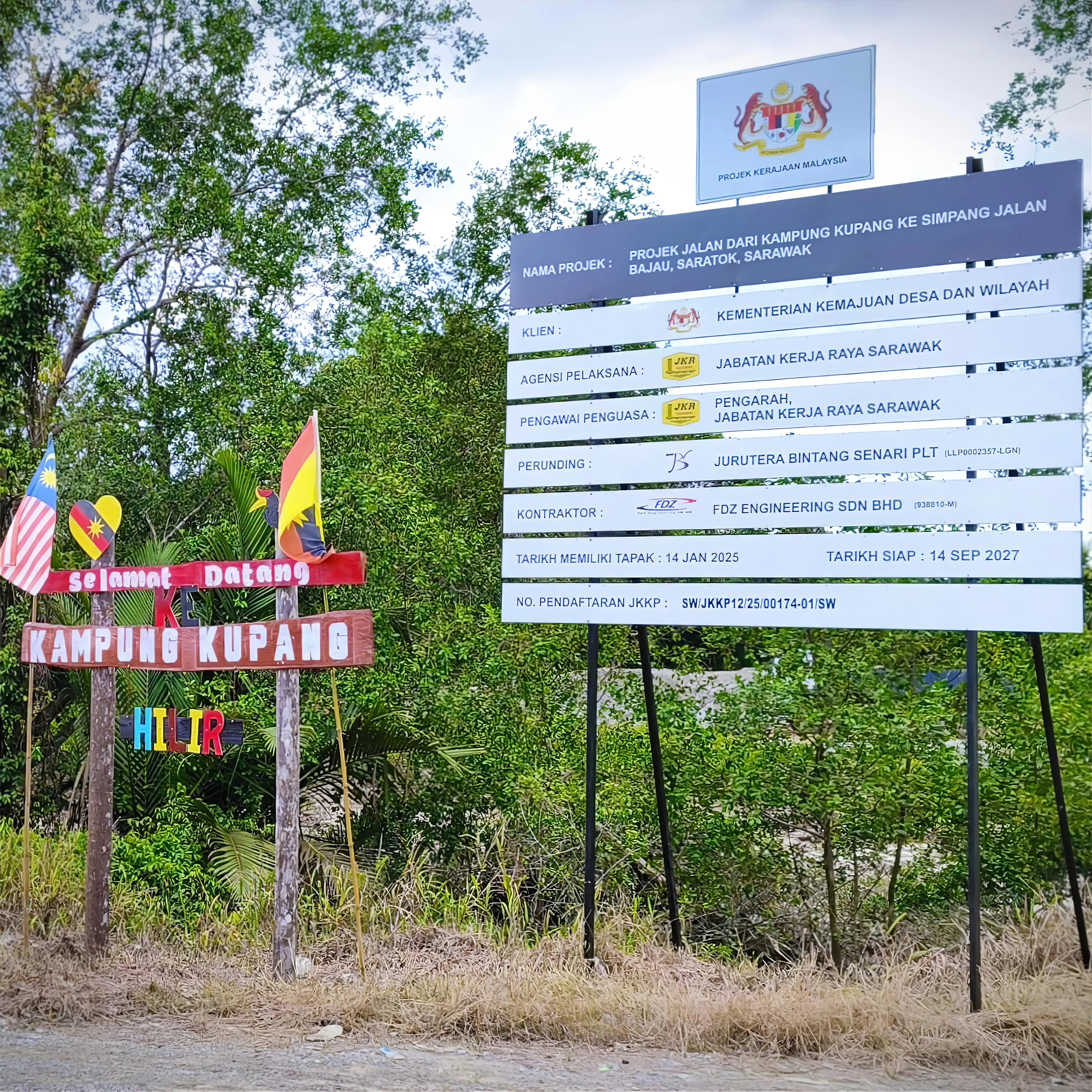 Project signboard by KKDW — road construction from Kampung Kupang to Bajau road junction